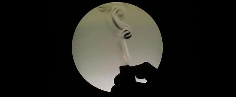 Schlieren optical image showing the airflow from a lighter flame