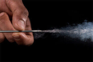 Ultra thin vacuum insulated sleeve transports liquid nitrogen while maintaining safe-to-touch external surface