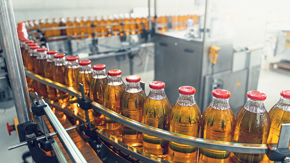 Bottles in a food and beverage processing and manufacturing facility